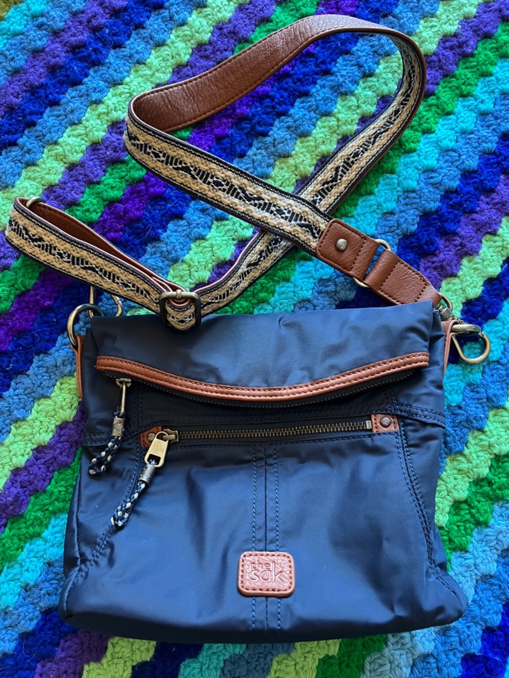 The Sak Navy Crossbody with Brown Trim and Patterned Strap